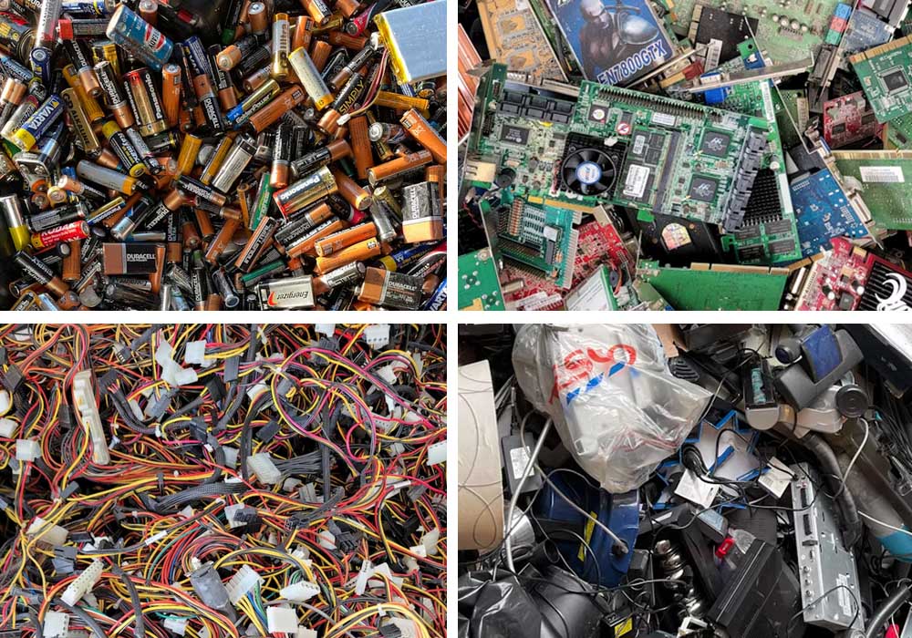 The picture shows some electronic waste: used batteries, discarded circuit boards, discarded cables, and discarded electronic equipment.